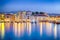 Travel Concepts. Picturesque Image of Old Venetian Harbour of Chania with Fisihing Boats and Yachts on the Foregound Taken At Blue