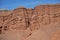 Travel destination, famous landmark Kyrgyzstan. Rocky columns of red sandstone in Konorchek canyon, Kyrgyzstan