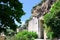 Travel destination, small ancient village Cotignac in Var, Provence, surrounded by vineyards and cliffs with troglodytes houses