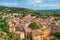 Travel destination, small old village in hear of Provence Cotignac with famous cliffs with cave dwellings and troglodytes houses