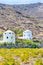 Travel Destinations. Traditional Round Greek Mill Houses on Santorini Island on Caldera Mountains