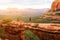 Travel in Devil`s Bridge Trail, man Hiker with backpack enjoying view, Sedona, Arizona, USA