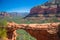 Travel in Devil's Bridge Trail, scenic view panoramic landscape in Sedona, Arizona, USA. Happy young woman on the