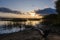 Travel on eastern europe. View of calm River and dramatic sky on sunset