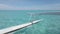 Travel in French Polynesia in Outrigger boat in coral reef lagoon in Tahiti