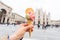 Travel, Italy and holidays concept - Ice cream in front of Milan Cathedral Duomo