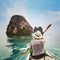 Travel by kayak in Asia, beach holiday tourism activity, man tourist kayaking