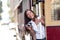 Travel lifestyle Asian woman tourist riding the famous tramway cable car system in San Francisco city, California during summer