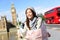 Travel London tourist woman holding map