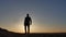 Travel. Man is walking at sunset silhouette journey travel lifestyle