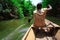 Travel by native style canoe in africa forest