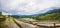 Travel nature lover asian woman and asian man walking view the field rice in rainy season at Ban Papongpieng Chiangmai Thailand