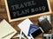 Travel plan 2019 word on black chalk board decorate with travelling item. travel planning concept