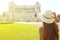 Travel in Rome. Back view of beautiful girl visiting Venice square famous landmark of Rome. Summer holidays in Italy