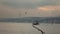 Travel ship in a Bosphorus strait on a background og evening sunset cloudy sky. Istanbul Turkey.