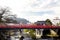 Travel Takayama, Japan with red bridge over river