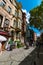Travel to Istanbul vertical photo. Tourists in a street of Balat district