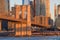 Travel to New York. The skyline of Manhattan photographed during a summer sunrise, view to Brooklyn Bridge.