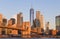 Travel to New York. The skyline of Manhattan photographed during a summer sunrise, view to Brooklyn Bridge.