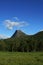 Travel to Norway, a mountain with a cloud, similar to an active volcano