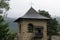 Travel to Romania: Voronet monastery entry tower on a rainy day