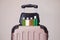 Travel toiletries, small plastic bottles of hygiene products on the suitcase