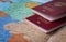 Travel and tourism concept with passport travel documents on world map background.