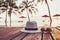 Travel and tourism concept, sunglasses and hat near tropical swimming pool