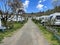 Travel trailers parked at caravan campsite in nature. Riva, Istanbul, Turkey - April 04, 2022