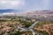 Travel Turkey - above view of Uchisar town and roads in valley in Nevsehir Province in Cappadocia in spring