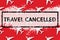 Travel, vacation ban, refund concept. Pattern of white airplanes with text travel cancelled on red background. Flight cancellation