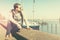 Travel or Vacation Concept. Closeup traveler looking ahead. Travel retro concept. View in front of mans face on sea background. T