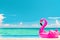 Travel Vacation Pool Beach travel concept with inflatable pink flamingo float toy mattress in luxury swimming pool