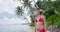 Travel woman walking on paradise beach on holidays vacation on Bora Bora