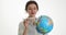 Travel world by plane. Pretty girl holding an airplane and world map globe