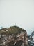 Traveler alone on seaside rocky cliff Norway