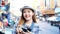 Traveler Asian blogger women travel in Bangkok, Thailand, beautiful female using mobile phone make vlog and live in social media .