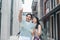 Traveler Asian couple direction on location map in Beijing, China, sweet Asia couple looking on map find landmark while spending