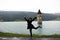 Traveler asian thai woman travel and posing for take photo at Submerged tower of reschensee church deep in Resias Lake