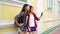 Traveler backpacker Asian women lesbian lgbt couple travel in Bangkok, Thailand. Happy blogger young female couple using smartphon