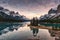 Traveler canoeing with rocky mountain reflection on Maligne lake at Spirit island in Jasper national park