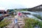 Traveler crossing bamboo bridge or Mon Bridge in Sangklaburi. Kanchanaburi, Thaila