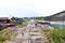 Traveler crossing bamboo bridge or Mon Bridge in Sangklaburi. Kanchanaburi, Thaila