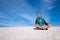 Traveler dreaming and relax among sand dunes