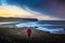 Traveler enjoying the Black sand beach view in Iceland