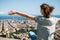 Traveler enjoying the cityscape of mountain, Barcelona, Catalonia, Spain