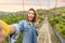 Traveler at the famous suspension bridge in Khndzoresk, Armenia, leading tourists to the ancient cave city