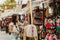 Traveler girl buying souvenirs in the traditional Mexican market in Mexico streets, hispanic tourists standing in outdoor Latin Am