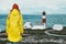 Traveler girl enjoying Norway lighthouse sea landscape Travel Lifestyle concept adventure scandinavian