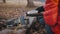 Traveler girl pouring tea from thermos cup during hike. Woman pouring a hot drink in mug from thermos. Refreshment